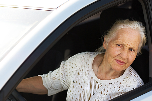bigstock Old Woman Driving Car 5100813 resized 600